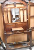 A late 19th or early 20th Century mahogany hall stand having mirror back , width approx. 99cm