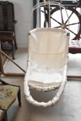 A vintage 'leaf' style hanging chair , with metal frame