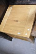A modern golden oak occasional table, approx. 50 x 50cm