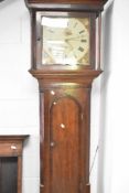 A 19th Century oak long case clock having 30 hour movement and painted roman numeral dial with