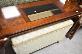 A reproduction console table having glass insert, width approx. 122cm