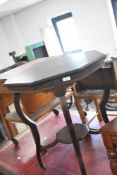 A Victorian mahogany occasional table having octagonal top and inlaid decoration, diameter approx.