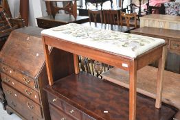 A vintage duet piano stool