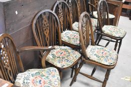 A set of eight (six plus two) traditional wheel back dining chairs