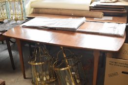 A Scandinavian teak table 92cm wide, 165cm long extending to 250cm with 2 leaves to insert