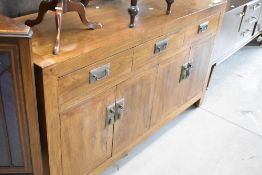 An Oriental hardwood sideboard, width approx. 150cm