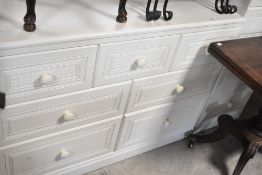Two modern white laminate bedroom chests, Alstons