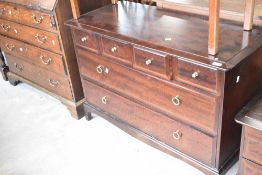 A set of 4 short over two long Stag bedroom drawers and two sets of bedside drawers