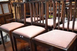 Eleven dining chairs comprising sets of four and three Georgian mahogany and four later reproduction