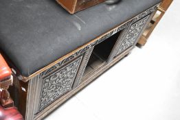 A period oak three panelled kist , having carved panels with added monogram and date 1664, having