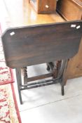 A Victorian folding occasional table, width approx. 61cm