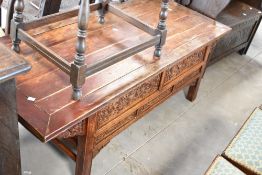 An Oriental hardwood coffee table