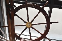 A vintage decorative ships wheel, diameter approx. 122cm