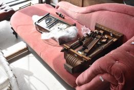 A Victorian chaise longue having later pink dralon upholstery