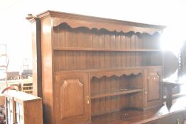 A late 19th or early 20th Century oak dresser , width approx. 183cm
