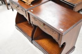A pair of modern/vintage Rossmore bedside tables, width approx. 56cm
