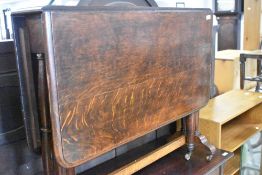 A late 19th or early 20th Century oak gateleg dining table in the Sutherland style, width approx.