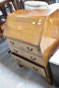 An early 20th Century Edwardian style bureau having inlaid decoration, width approx. 76cm
