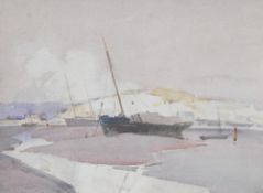 Van Jones (20th century) watercolour, estuary scene with grounded fishing boats, signed lower right,
