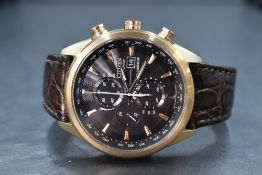 A Citizen World Chronograph A.T Limited Edition wristwatch, the brown dial having baton numerals,