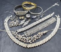 A selection of diamante costume jewellery including bangles, earrings, necklaces, earrings and