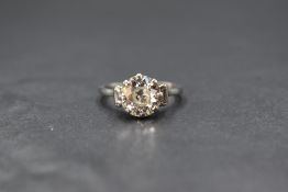 A platinum and diamond solitaire ring, the brilliant cut diamond being approx 2.5ct in an eight claw