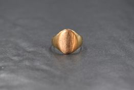 A 9ct gold signet ring of plain form, size L/M & approx 2.1g, signs of wear