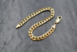 A 9ct gold curb link bracelet, marked 375, 21.5cm, 20g