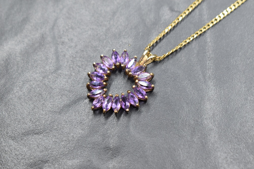 A 9ct gold amethyst open heart pendant with a flat curb link 18' chain, approx 8.3g gross - Image 2 of 3
