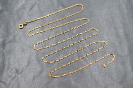 An 18ct gold thin curb link neck chain, marked 750, 72.3cm, 4.9g