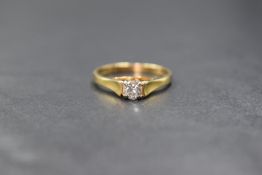 An 18ct gold diamond set solitaire ring, the diamond measuring approximately 0.50ct having good