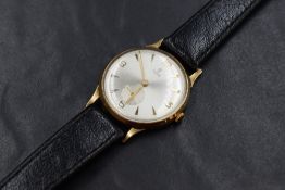 A 9ct gold Tudor watch, the champagne dial having baton and Arabic numerals with a subsidiary