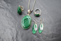 Four pieces of malachite jewellery in white metal mounts stamped 925, including necklace, earrings