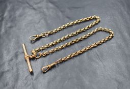 A yellow metal presumed gold watch chain, having two dog clips and T-bar, unmarked, 40cm, 18.7g