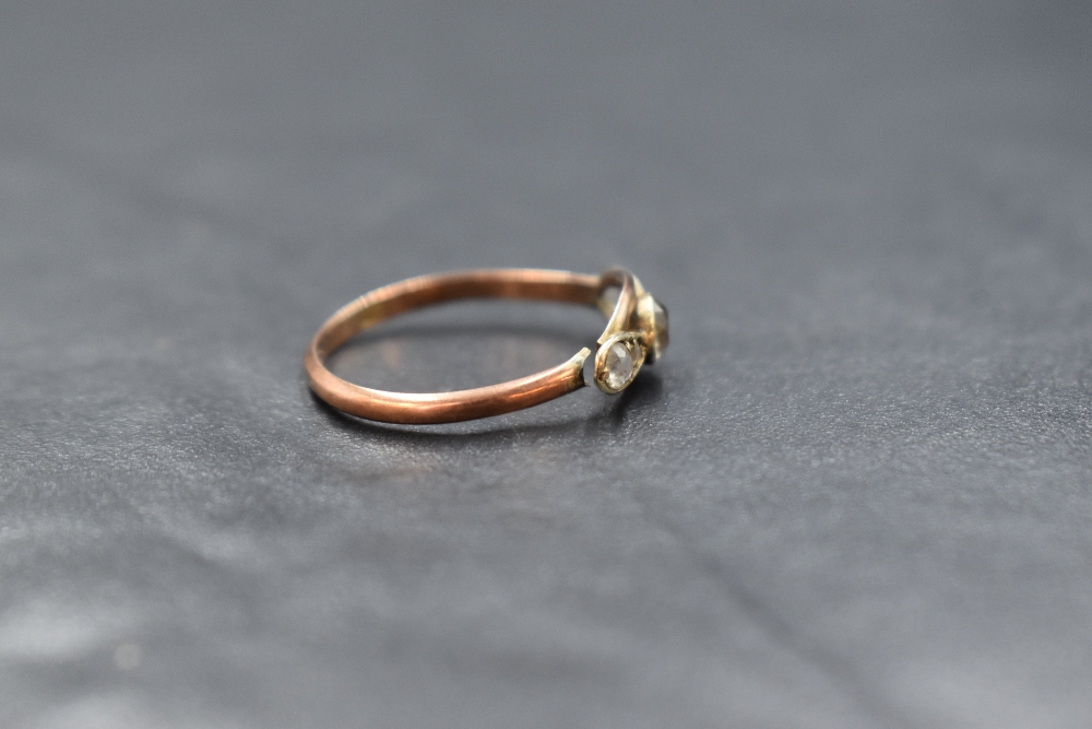 A 9ct gold diamond set five stone ring, the central round cut diamond measuring approximately 0.20ct - Image 2 of 4