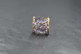 A 9ct gold pale blue open flower cluster ring by QVC, the marquise cut stones possibly tanzanite,