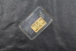 A Suisse 1g Gold Bar, 999.9 Fine Gold in plastic wallet