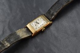A 9ct gold wristwatch, the cream dial having Arabic numerals and subsidiary dial, the case marked