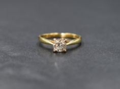 An 18ct gold diamond solitaire ring, the brilliant cut diamond, approx 0.45ct in a raised 4 claw