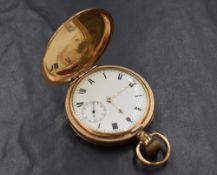 A gold plated top wound full hunter pocket watch, the white dial having Roman numerals and