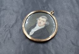 A 19th century yellow metal presumed gold mounted portrait miniature, of circular form depicting a