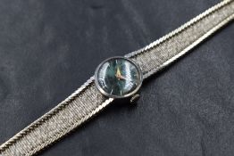 An 18ct white gold Sarcar wristwatch, the marble green dial having baton numerals, numbered 223568
