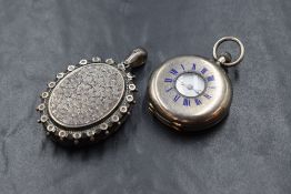 A small silver Hunter top wound pocket watch having a Roman numeral dial to enamelled face with a