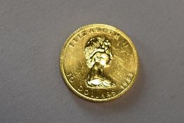 Gold Ten Dollars Canadian 1983 Coin, Obv Young Bust Elizabeth 11, Rev Maple Leaf Flanked by 9999,