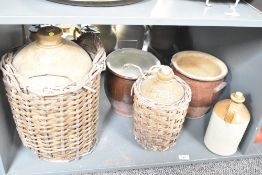 A stoneware jug having impressed marks for 'George Bird, Penrith', h29cm, sold together with 2 other