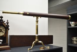 A 19th / 20th century Dollond of London telescope on tripod stand having two eye pieces