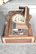 A late 19th century Ansonia (USA) Gingerbread clock having single gong chime, h56