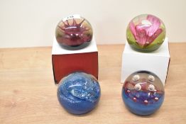 A limited edition Caithness glass paperweight dated 1975, No 308/500, h6cm, sold together with 3