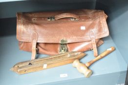 A leather Cheney bag, w48cm, sold together with a gavel (possibly made from olive wood) ect
