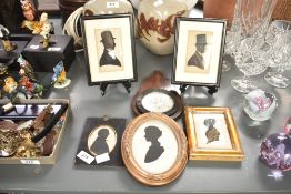 A 19th century silhouette portrait miniature of a gentleman, h13cm, sold together 5 others